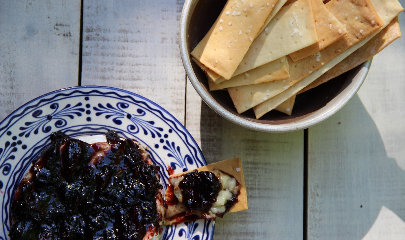 Firehook Crackers with Baked Brie Smothered in Elderberry Ginger Pecan Jam