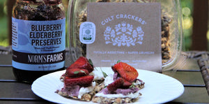 Cult Crackers with Goat Cheese, Berries and Norm's Farms Jam