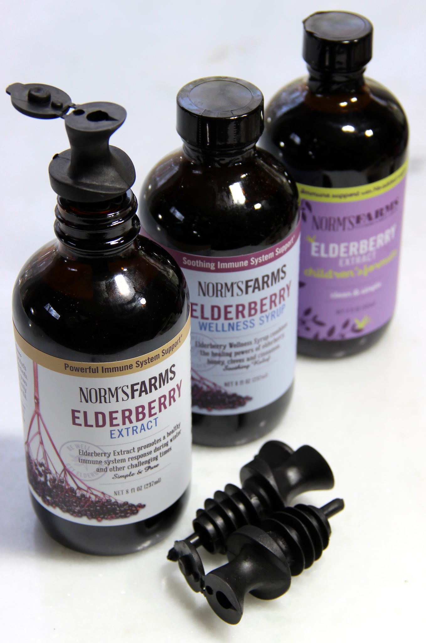 No mess, easy pour, reusable elderberry syrup spout.